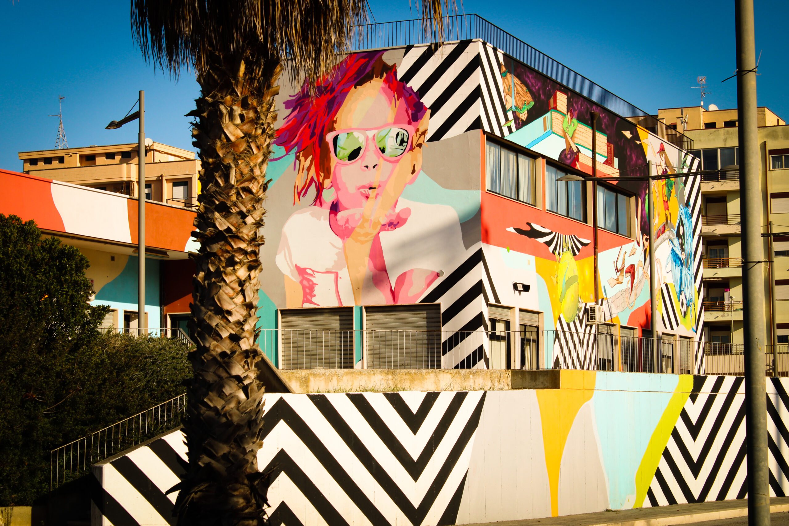 VIVERE È SOGNARE nell’ambito del progetto “Libri per la pelle – interventi artistici di arte urbana”